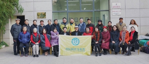 IUP国际摄影家联盟云南分会副主席赵月华主持会议。供图